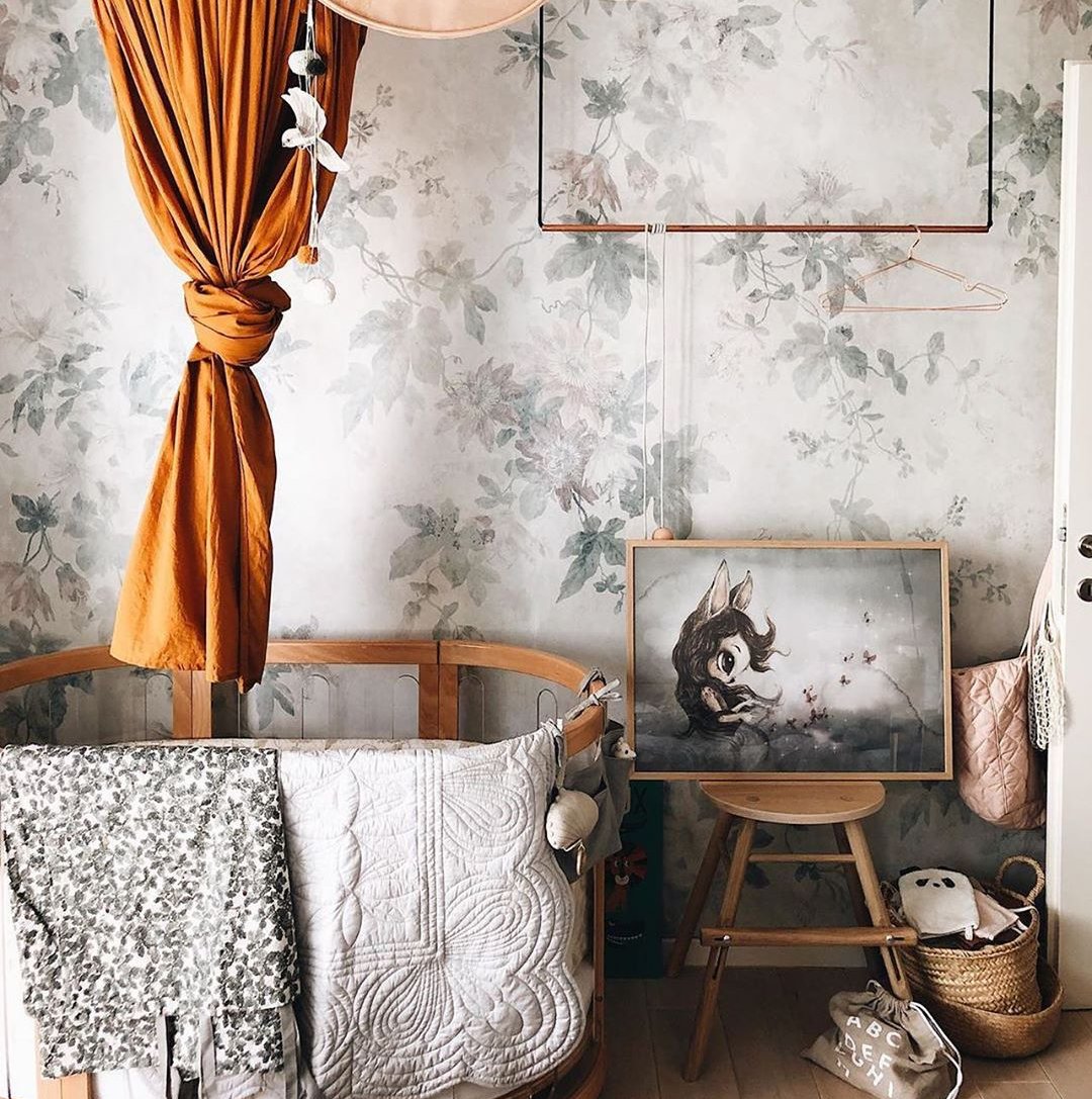 A neutral gender nursery featuring a mist cot quilt by Bonne Mere