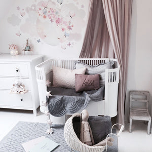 Calming nordic and Scandinavian nursery decor featuring elephant grey cot quilt by Bonne Mere