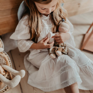 little girl in organic cotton night dress before bed time