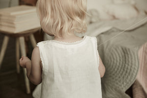 little girl wearing bonne mere white pure linen nightie dress 